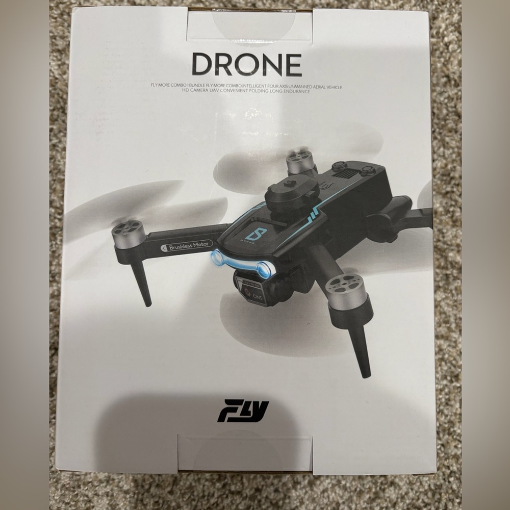 BRAND NEW - NEVER OPENED
Fly Black and Blue Drone